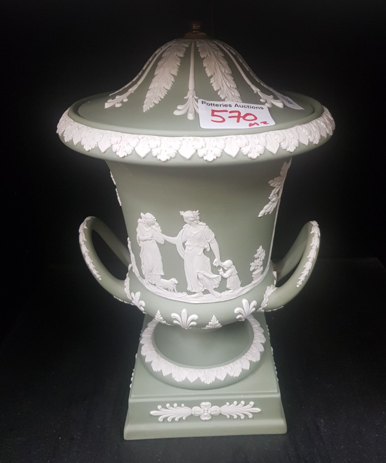 Wedgwood Green jasperware twin handled lidded pedastal urn