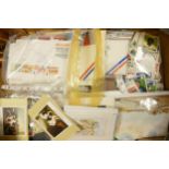 A mixed collection of items to include Stamps, First day covers, collectors cards, postcards etc