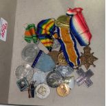 Small group of medals and coins to include 1914-15 star & WW1 Victory medal, (awarded to Private