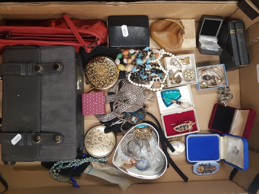 A mixed collection of costume jewellery to include broaches, necklaces, watches, pendants etc (1