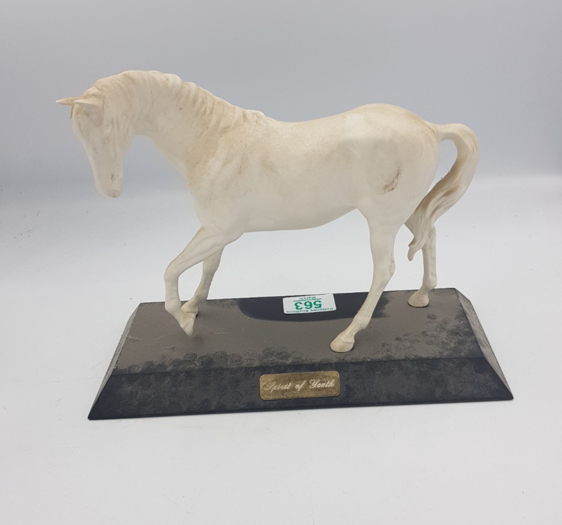 Beswick Spirit of Youth on wooden plinth