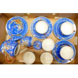 A collection of Oriental Egg Shell Type teaware decorated with dragons, some damages noted