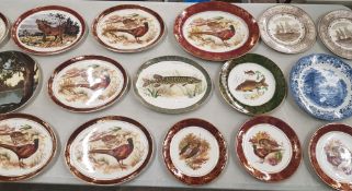 A large collection of decorative wall plates mostly 'Weatherby Hanley' examples with wildlife