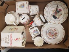 A mixed collection of Royal Doulton Nursery ware items to include money boxes, musical box, wall