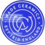Wade Ceramics circular perspex sign, d.75cm. This item was removed from the reception of the Wade