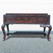 Finely carved Japanese Meiji period table, losses to carved table edge.