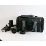 Olympus OM10 35mm film camera, Zuiko Auto S 50mm lens fitted, Vivitar 70-200mm Macro focusing Zoom