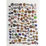 A collection of early 20th century & later enamel pin badges & similar with varying themes