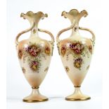 Carlton Blush ware pair of twin handled vases with Foxglove & heather floral decoration, by Wiltshaw