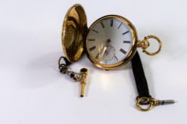 18ct gold plated hunter pocket watch, with ornately decorated case.