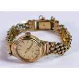 Unbranded 9ct hallmarked gold ladies quartz watch & 9ct gold bracelet, Gross weight 17.6g, not