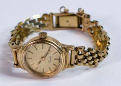 Unbranded 9ct hallmarked gold ladies quartz watch & 9ct gold bracelet, Gross weight 17.6g, not