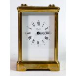 A 20th century Angelus brass cased carriage clock, the white dial with Roman numerals in black,