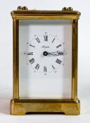 A 20th century Angelus brass cased carriage clock, the white dial with Roman numerals in black,