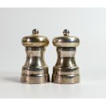 Large modern hallmarked silver pepper mill and salt grinder, gross weight with some workings 345g.