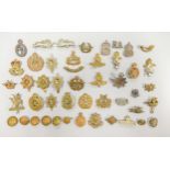 A collection of vintage Military cap badges & buttons including RAF, Royal Flying Corps, Sudan