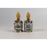 Lynton Fine Porcelain pair of scent bottles & covers, gilded on dark blue ground, hand painted