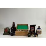A collection of Wade decanters to include - Chivas miniatures, Royal Salute x 3, Pussers Rum etc. (