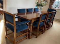 Good quality reproduction oak Refectory table with matching upholstered 6 chairs and 2 carver