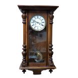 Walnut Vienna wall clock, sprung movement with pediment missing, length 90cm