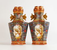 Pair of decorative 20th century Chinese vases decorated with birds of paradise, height 28cm (2)