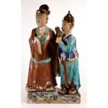 Chinese Shiwan Daoist pottery figure group, Qing Dynasty, h.62 x d.16.5 x w.35, (a/f loss to fingers