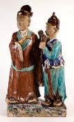 Chinese Shiwan Daoist pottery figure group, Qing Dynasty, h.62 x d.16.5 x w.35, (a/f loss to fingers