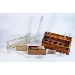 Wooden Apothecary test tube/instrument holder with a collection of antique glass Douches & Vessels