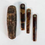 Early 19th century French leather cased set of three blood Letting Fleams in horn sheaths.