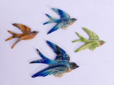 Wade unmarked Flight of Swallows metal wall plaques, length of largest 11cm, some paint crazing.