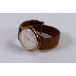 9ct gold Garrard gentleman's mechanical wristwatch, seconds dial with leather strap, in original