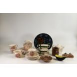 A mixed collection of Wde items to include - cups, saucers, Irish Wade vase, Wagon Train ashtrays,