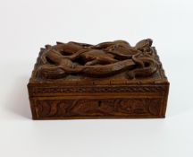 Early 20th century wood box, carved all around with dragons, 20 x 12 x 8cm.