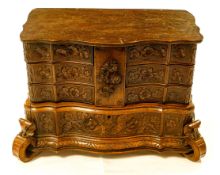 19th century Black Forrest multi compartment carved jewellery box, height 22cm & length 33cm