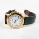 Gucci gentlemans Quartz professional gold plated wristwatch with leather strap.