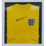 Signed Gordon Banks Yellow Football shirt, frame size 69 x 74cm