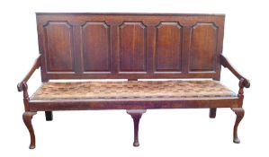 Early 19th century Oak five panel Settle on Queen Anne supports, length 182cm, height 110cm &