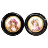 Two framed 19th century hand painted portrait plaques, diameter of frame 36cm (2)