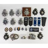 A good collection of vintage police badges, patches, buttons etc.