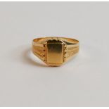 Yellow coloured metal signet ring, tested as about 18ct, ring size Q, weight 2.25 g.