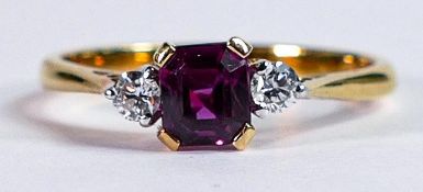 18ct gold ring set with centre square cut ruby with diamond on each side, size N, 2.7g.