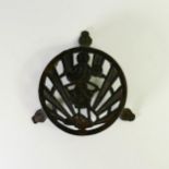 Cast iron Mickey Mouse trivet depicting an early iteration of Mickey Mouse