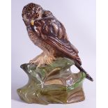 A rare Wade Earthenware model of an Eagle perched on a rock, c1930, h.35cm. This was removed from