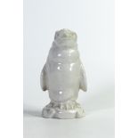 Wade white glazed figure of a penguin. Unmarked to base, height 12.5cm. These items were removed