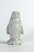 Wade white glazed figure of a penguin. Unmarked to base, height 12.5cm. These items were removed
