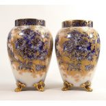Pair of Carlton Blush ware large footed vases with blue & white dahlia floral decoration, by