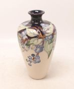 Moorcroft trial vase decorated with flowers,h.16.5cm, boxed.