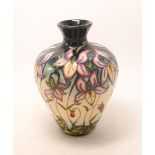 Moorcroft trial vase in a floral design, dated 2008,h.20cm, boxed.