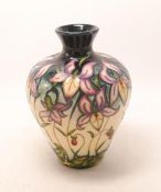Moorcroft trial vase in a floral design, dated 2008,h.20cm, boxed.