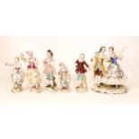 A collection of Dresden porcelain figures to include two Sitzendorf examples etc.